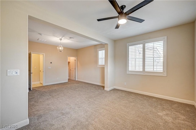 1004 Bluebird Ridge Ct, North Las Vegas, NV 89084 - carpeted empty room with ceiling fan and a chandelier
