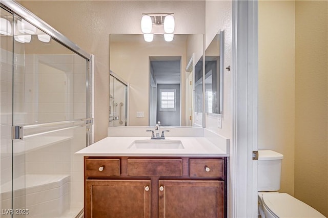 1004 Bluebird Ridge Ct, North Las Vegas, NV 89084 - full bath with vanity, a stall shower, and a textured wall