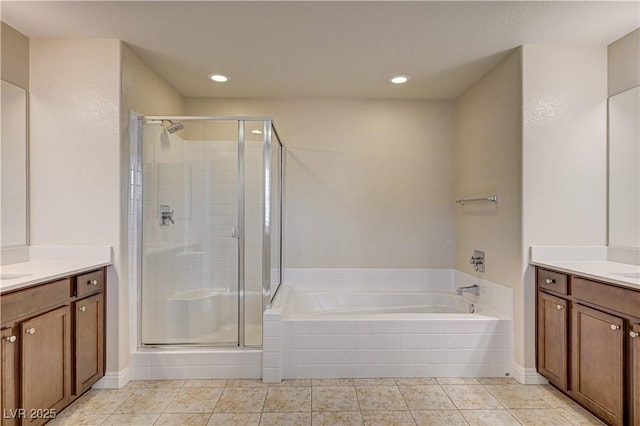 1004 Bluebird Ridge Ct, North Las Vegas, NV 89084 - full bath with vanity, a stall shower, a garden tub, recessed lighting, and tile patterned flooring