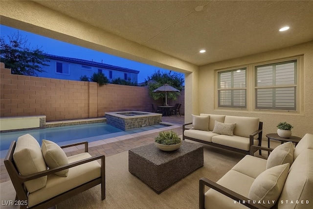 1004 Bluebird Ridge Ct, North Las Vegas, NV 89084 - fenced backyard featuring an outdoor living space and a patio