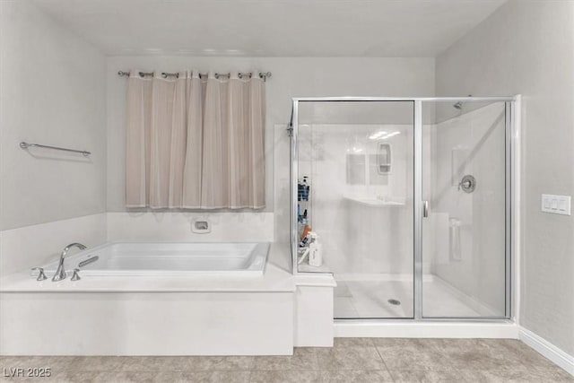 505 Punto Vallata Dr, Henderson, NV 89011 - full bathroom featuring a stall shower and a garden tub