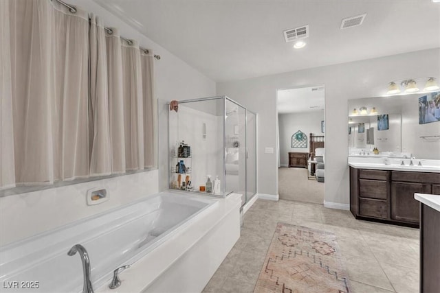 505 Punto Vallata Dr, Henderson, NV 89011 - full bathroom featuring vanity, visible vents, a shower stall, and a bath