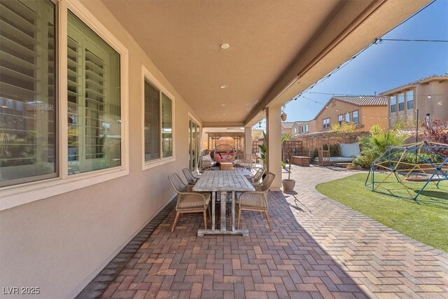 505 Punto Vallata Dr, Henderson, NV 89011 - view of patio / terrace featuring outdoor dining area and fence