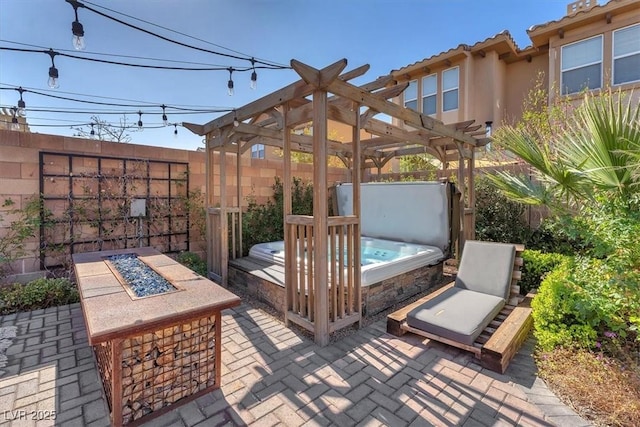 505 Punto Vallata Dr, Henderson, NV 89011 - view of patio with a pergola, fence private yard, and a hot tub