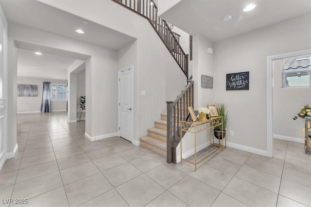 505 Punto Vallata Dr, Henderson, NV 89011 - staircase featuring baseboards, tile patterned flooring, and recessed lighting