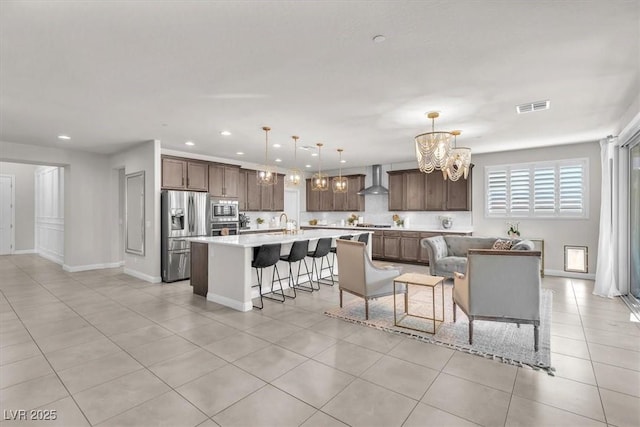 505 Punto Vallata Dr, Henderson, NV 89011 - living area featuring visible vents, a chandelier, baseboards, recessed lighting, and light tile patterned floors