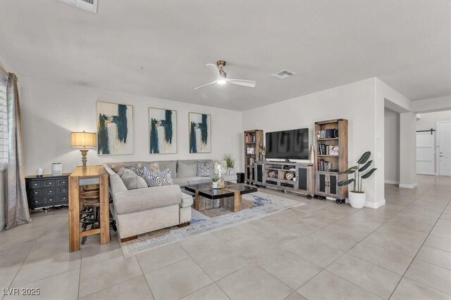505 Punto Vallata Dr, Henderson, NV 89011 - living room with baseboards, ceiling fan, visible vents, and tile patterned flooring