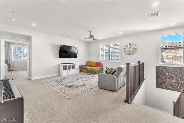 505 Punto Vallata Dr, Henderson, NV 89011 - living room with visible vents, baseboards, ceiling fan, recessed lighting, and carpet floors