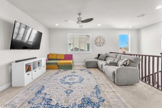 505 Punto Vallata Dr, Henderson, NV 89011 - carpeted living area with baseboards, a wealth of natural light, visible vents, and a ceiling fan