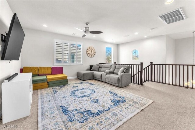 505 Punto Vallata Dr, Henderson, NV 89011 - carpeted living room featuring baseboards, visible vents, recessed lighting, and a ceiling fan
