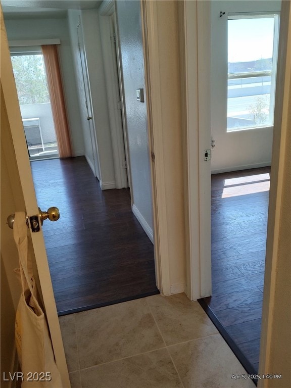 hallway featuring tile patterned floors