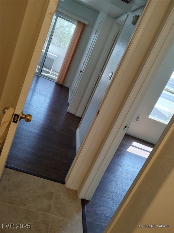 hall featuring wood finished floors