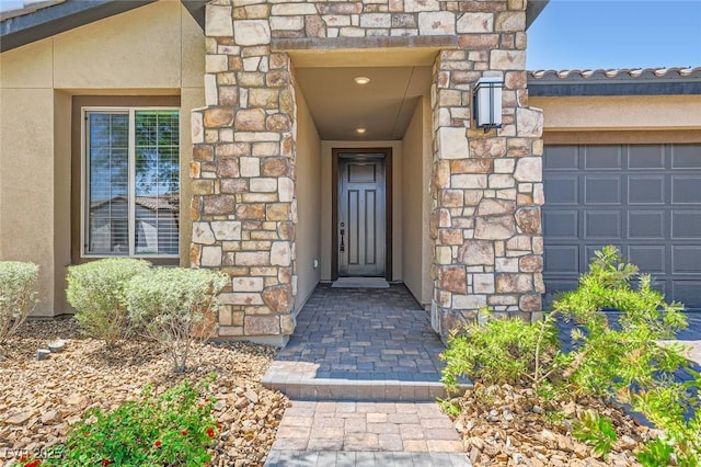 243 Sun Glaze Ave, Henderson, NV 89011 - doorway to property featuring stone siding and stucco siding