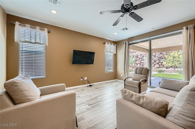 243 Sun Glaze Ave, Henderson, NV 89011 - living room with baseboards, light wood-type flooring, a ceiling fan, and recessed lighting