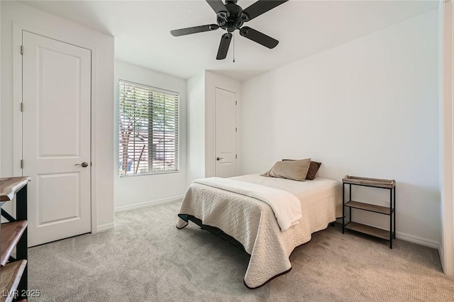 243 Sun Glaze Ave, Henderson, NV 89011 - bedroom featuring light carpet, baseboards, and a ceiling fan