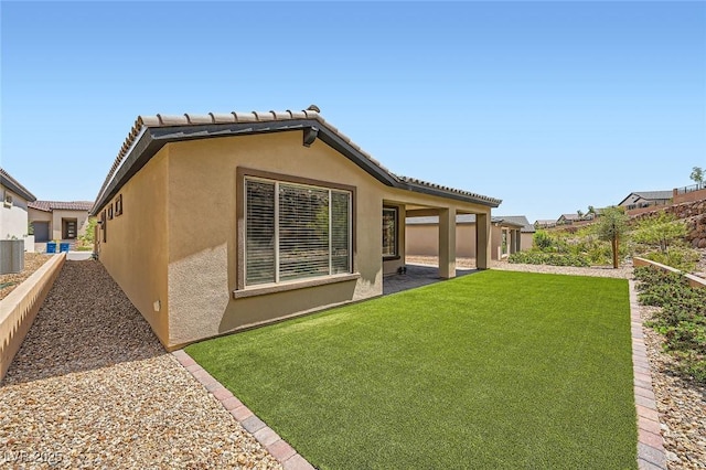 243 Sun Glaze Ave, Henderson, NV 89011 - back of property featuring stucco siding and cooling unit