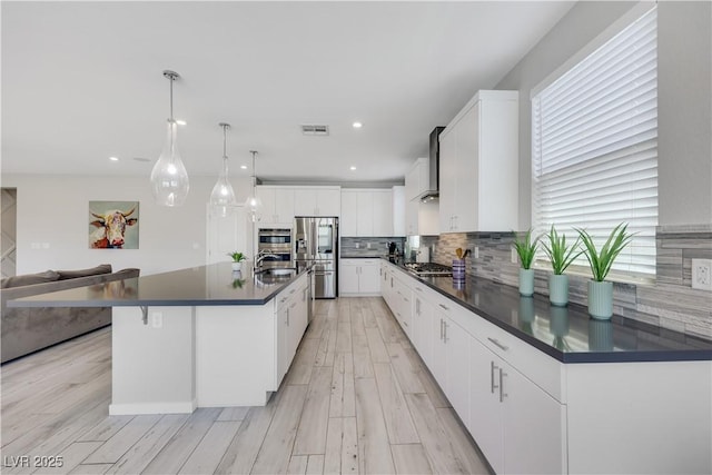 1609 Dream Canyon Ave, North Las Vegas, NV 89084 - kitchen featuring dark countertops, a sink, visible vents, and appliances with stainless steel finishes