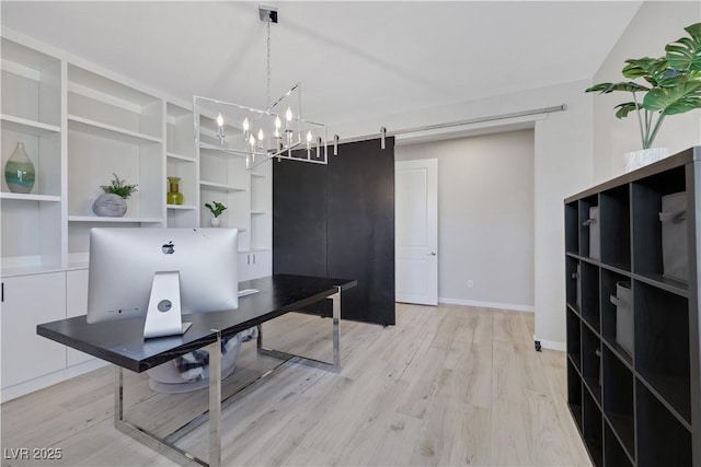 1609 Dream Canyon Ave, North Las Vegas, NV 89084 - office featuring a barn door, light wood-style flooring, baseboards, and an inviting chandelier