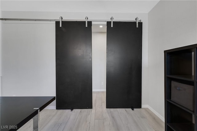 1609 Dream Canyon Ave, North Las Vegas, NV 89084 - interior space featuring wood finished floors and a barn door