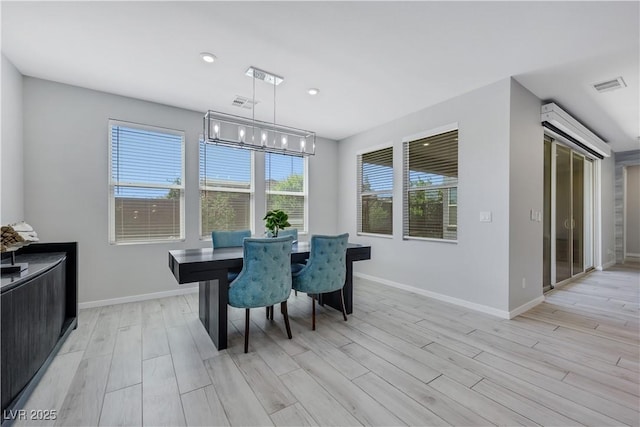 1609 Dream Canyon Ave, North Las Vegas, NV 89084 - dining room with recessed lighting, visible vents, light wood-style floors, baseboards, and a notable chandelier