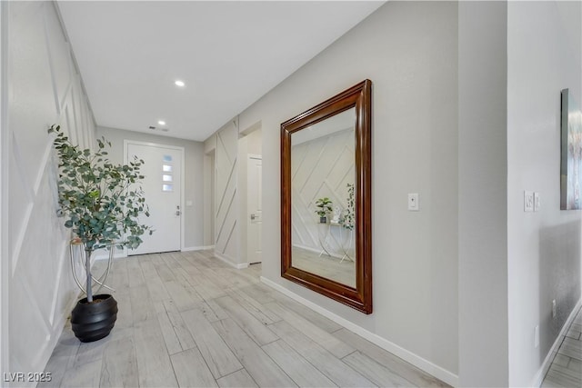 1609 Dream Canyon Ave, North Las Vegas, NV 89084 - hallway with light wood-type flooring, baseboards, recessed lighting, and visible vents