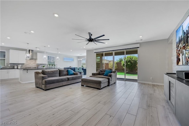 1609 Dream Canyon Ave, North Las Vegas, NV 89084 - living room featuring light wood-type flooring, baseboards, recessed lighting, and ceiling fan