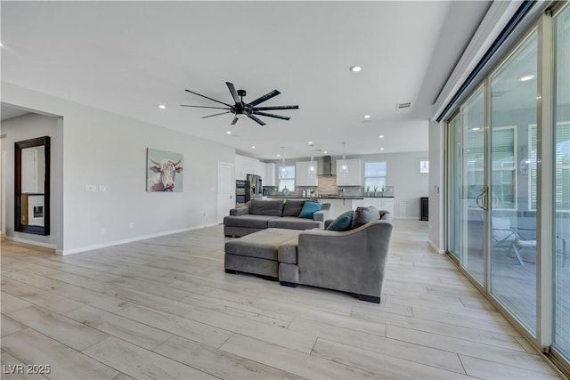 1609 Dream Canyon Ave, North Las Vegas, NV 89084 - living area with ceiling fan, recessed lighting, and light wood-type flooring