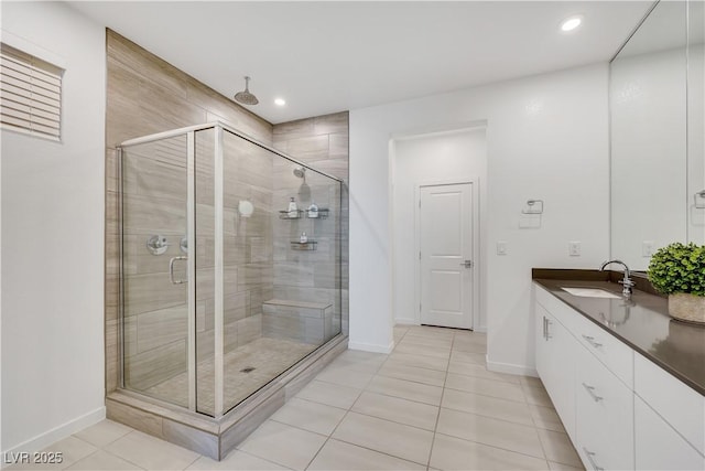 1609 Dream Canyon Ave, North Las Vegas, NV 89084 - full bath with tile patterned floors, baseboards, recessed lighting, and a stall shower