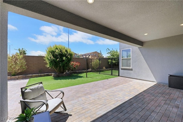 1609 Dream Canyon Ave, North Las Vegas, NV 89084 - view of patio featuring a fenced backyard