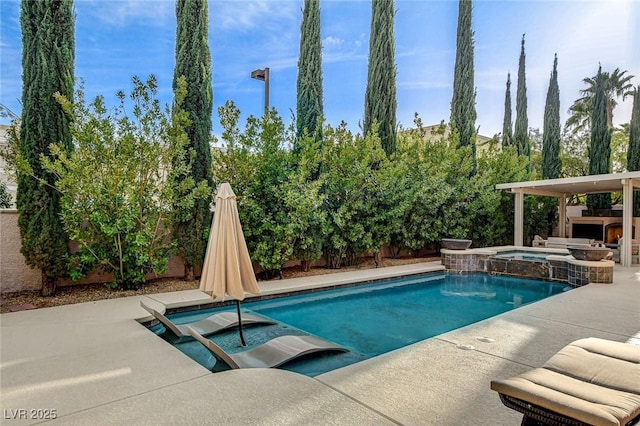 view of pool with a fenced backyard, a patio area, and a pool with connected hot tub