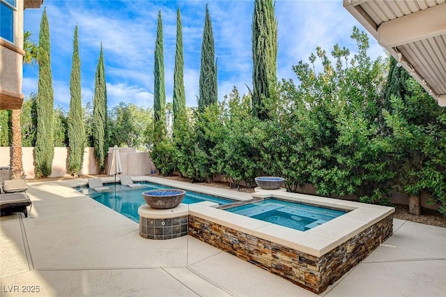 view of pool featuring a fenced in pool, a fenced backyard, an in ground hot tub, and a patio