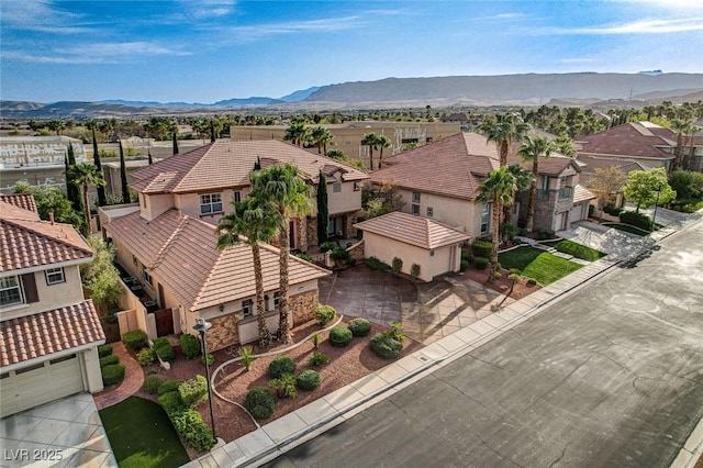 bird's eye view with a mountain view and a residential view