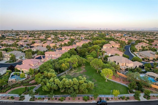 aerial view at dusk with a residential view