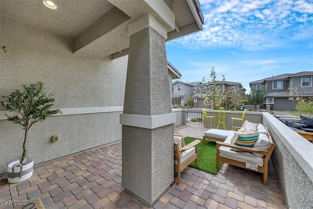 view of patio featuring a residential view