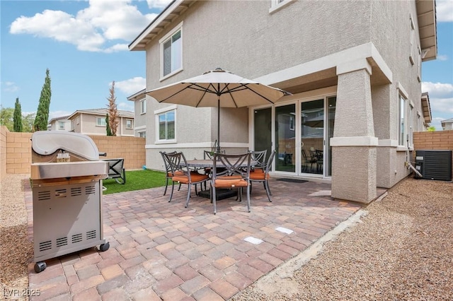view of patio / terrace featuring central air condition unit, grilling area, fence, and outdoor dining space