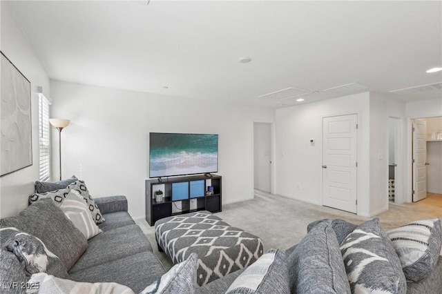 living room featuring carpet floors, baseboards, recessed lighting, and attic access