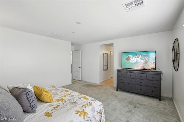 bedroom with visible vents, baseboards, and carpet floors