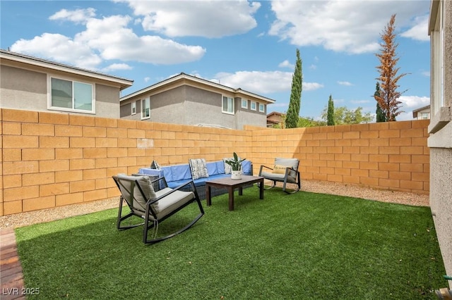 view of yard with a fenced backyard and an outdoor hangout area