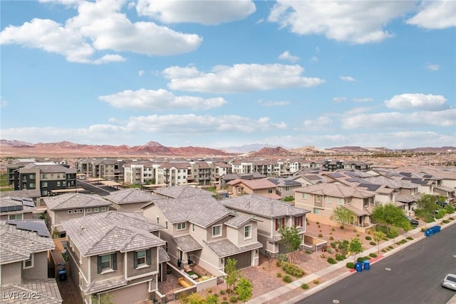 aerial view with a mountain view and a residential view