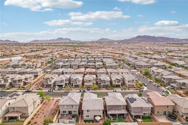 aerial view with a mountain view and a residential view