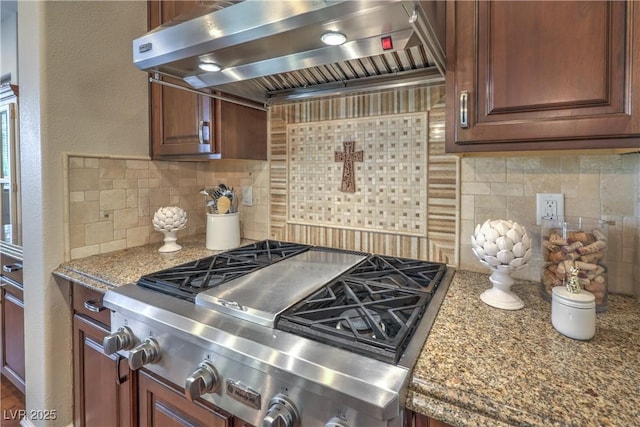 79 Rezzonico Dr, Henderson, NV 89011 - kitchen featuring extractor fan, stainless steel gas cooktop, tasteful backsplash, and stone counters
