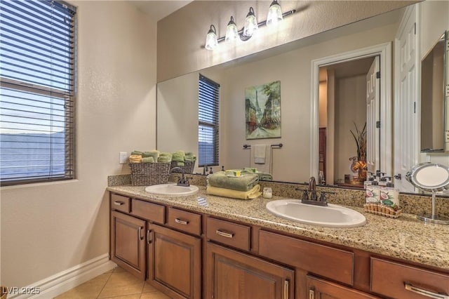 79 Rezzonico Dr, Henderson, NV 89011 - full bath featuring tile patterned flooring, double vanity, and baseboards