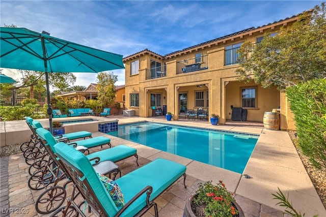 79 Rezzonico Dr, Henderson, NV 89011 - view of swimming pool with a patio and an in-ground hot tub