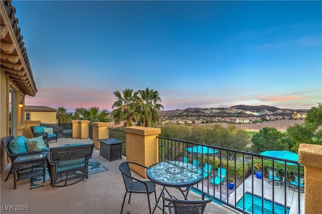 79 Rezzonico Dr, Henderson, NV 89011 - patio terrace at dusk with a balcony