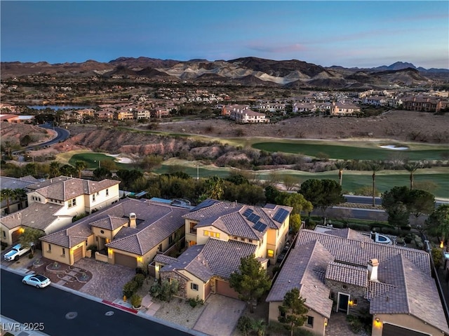 79 Rezzonico Dr, Henderson, NV 89011 - aerial perspective of suburban area featuring a mountain backdrop and a golf course