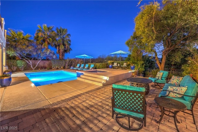 79 Rezzonico Dr, Henderson, NV 89011 - view of pool featuring a patio area, a fenced backyard, and an in-ground hot tub