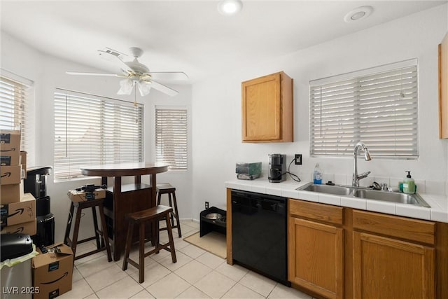 388 Coronado Dr, Henderson, NV 89015 - kitchen with black dishwasher, a sink, and plenty of natural light