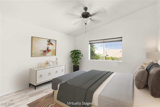 388 Coronado Dr, Henderson, NV 89015 - bedroom featuring light wood-type flooring, lofted ceiling, and a ceiling fan