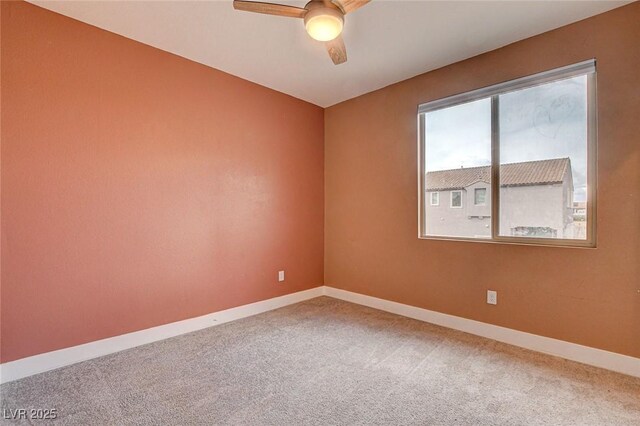9993 Birch Knoll Ave, Las Vegas, NV 89166 - carpeted spare room featuring baseboards and ceiling fan