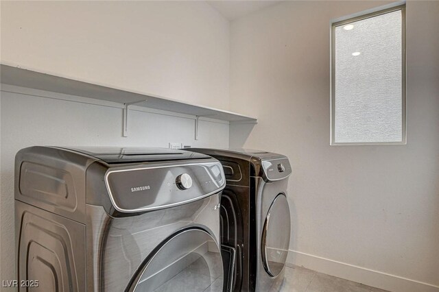 9993 Birch Knoll Ave, Las Vegas, NV 89166 - washroom with washing machine and dryer, baseboards, and tile patterned floors